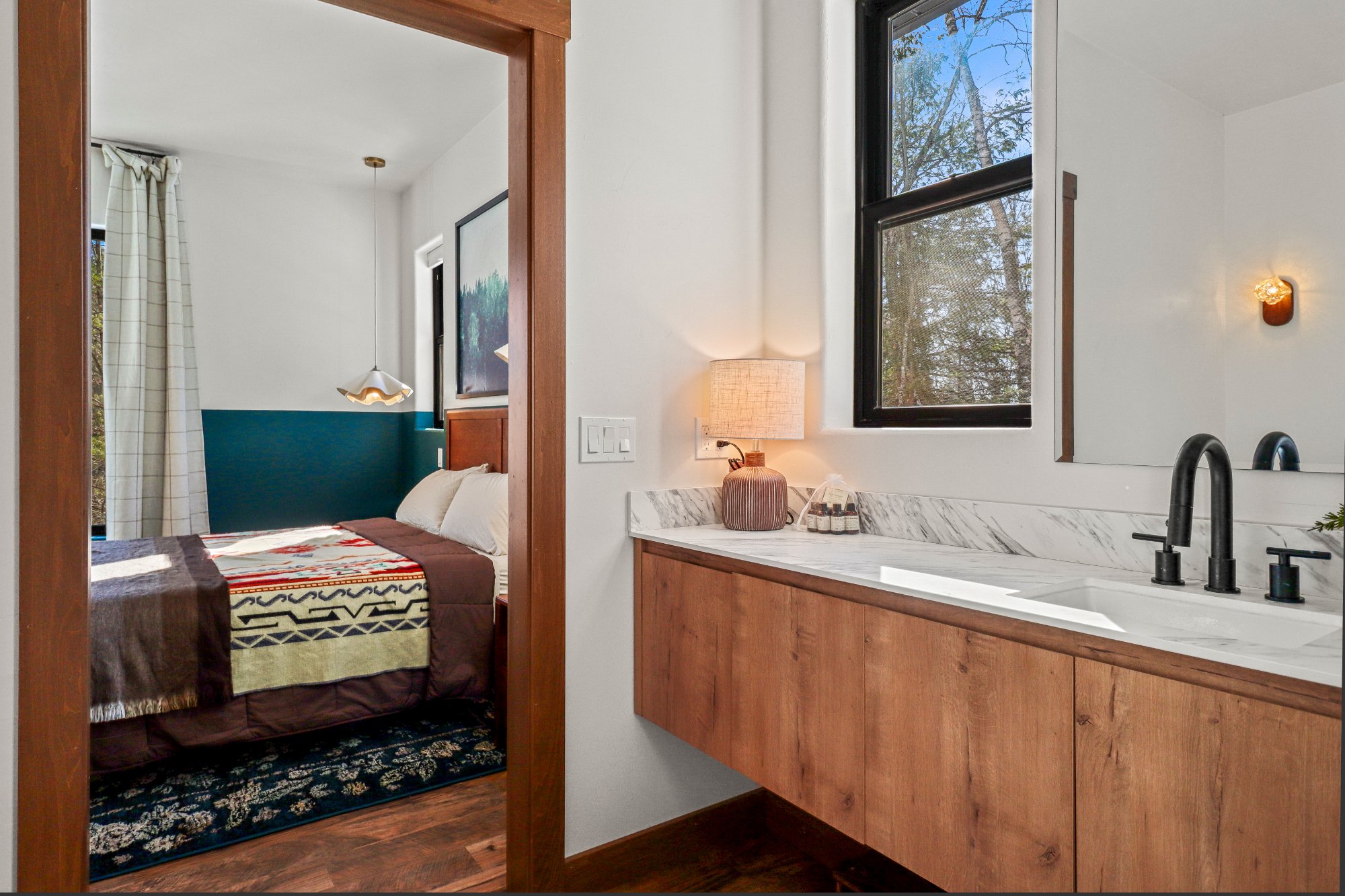 Bathroom vanity marble black fixtures bedroom view