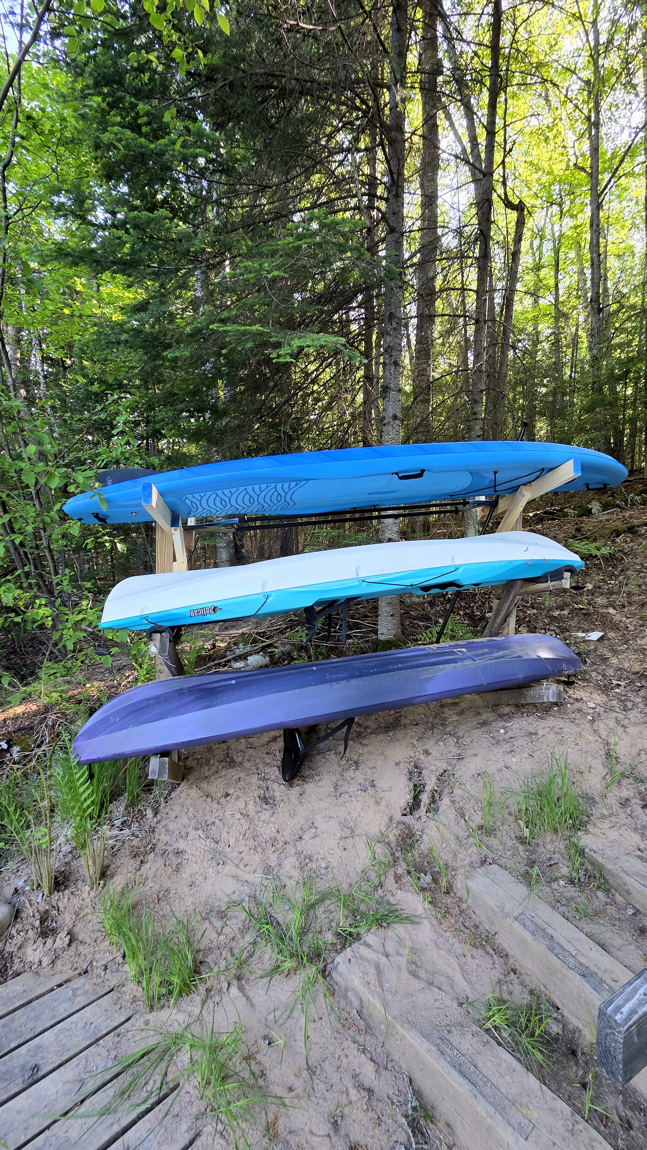 Kayaks and paddleboard provided for guests from May through October