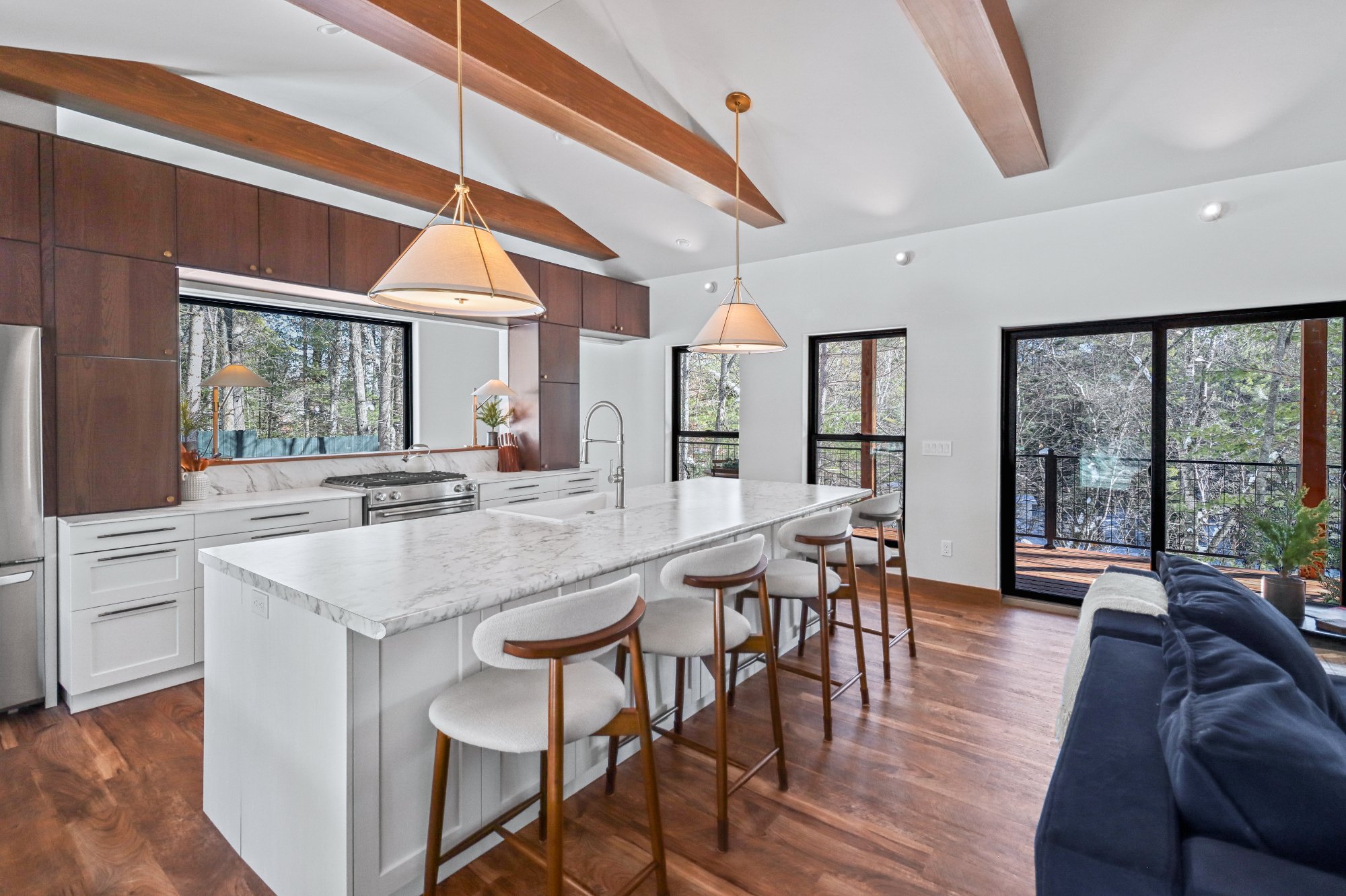 Kitchen island walnut cabinets deck view