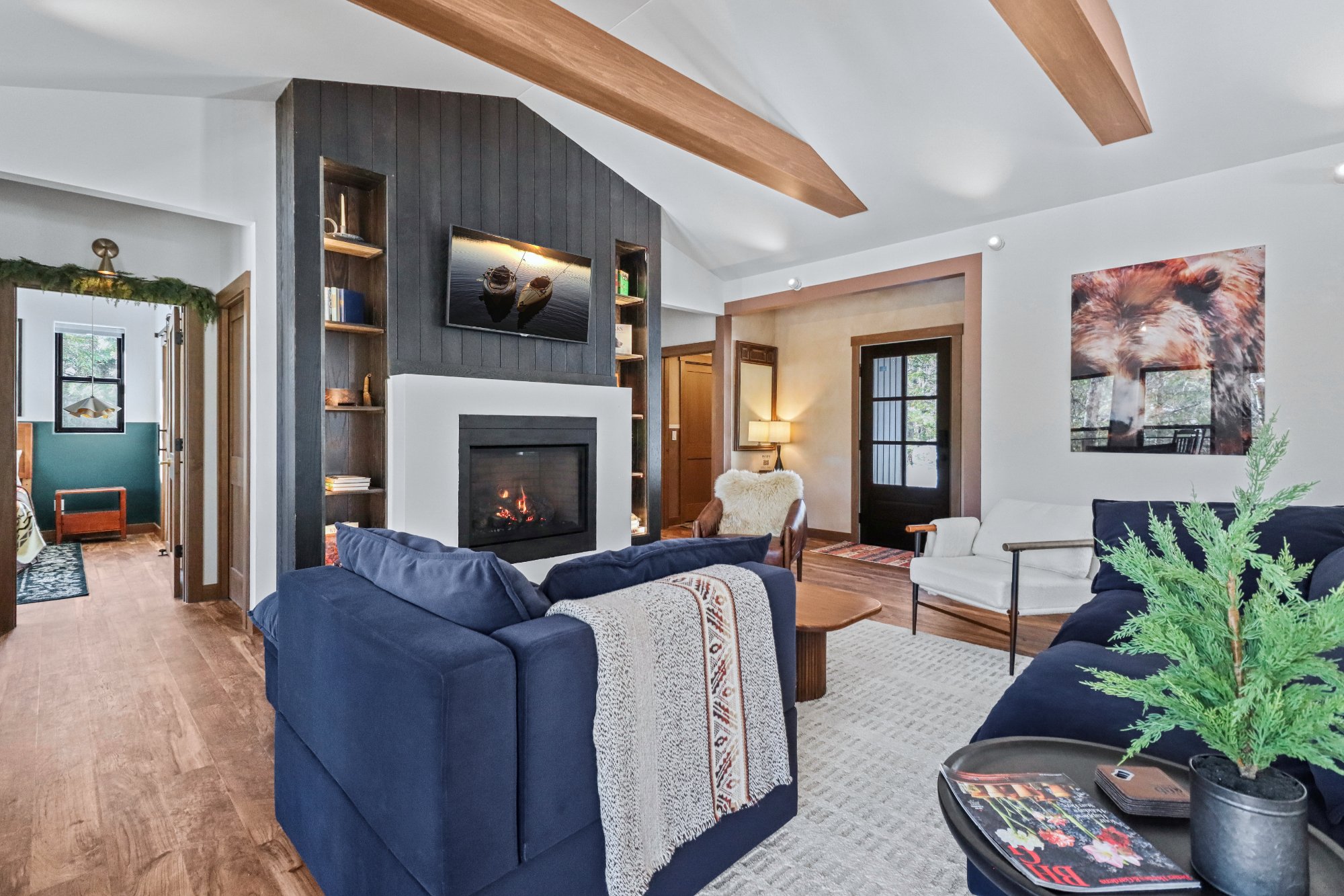 Living room fireplace angle bear art