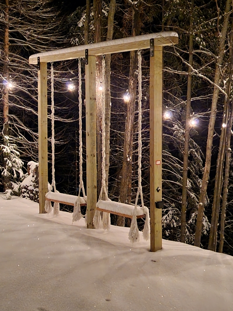 Macrame swings string lights snow winter night