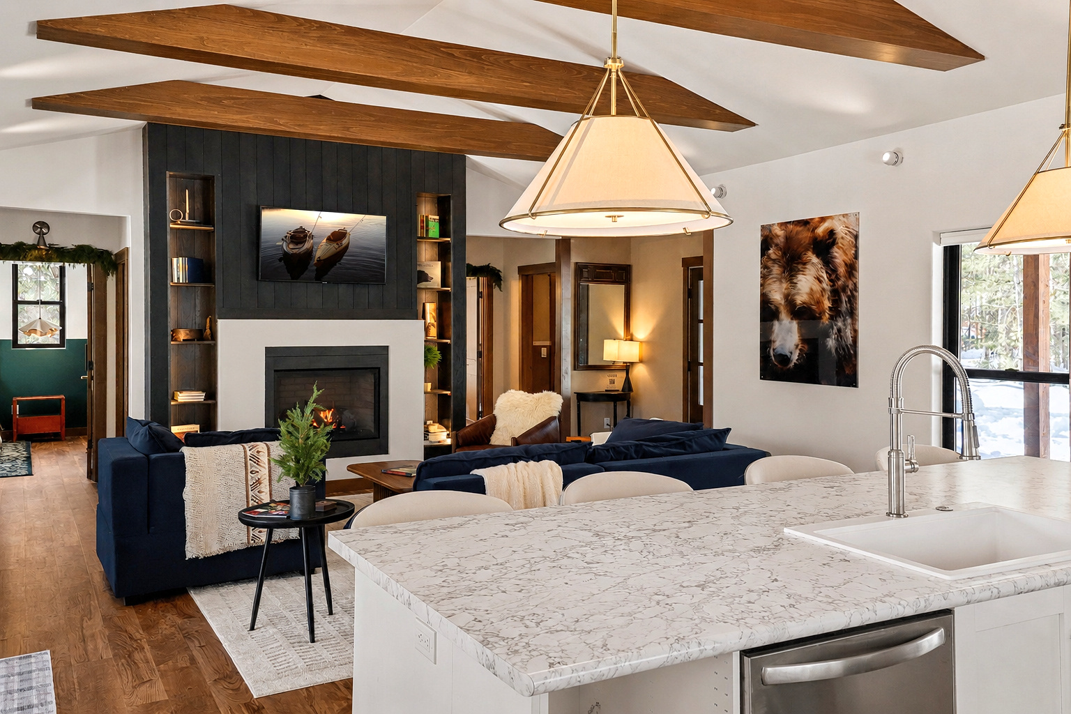 Marble kitchen island with the fireplace beyond