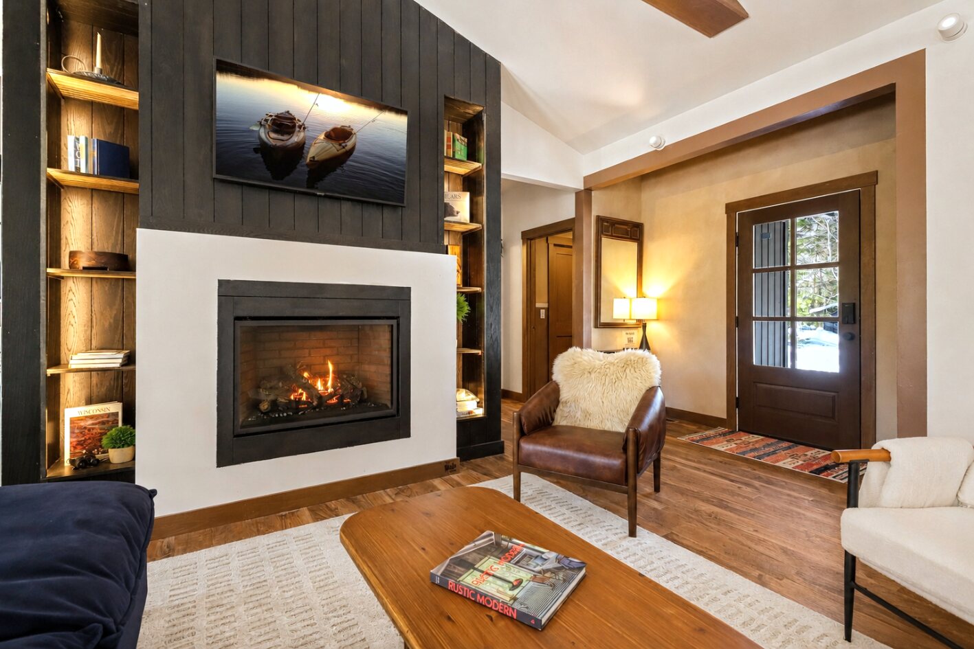 Fireplace, built-in shelves, and entry