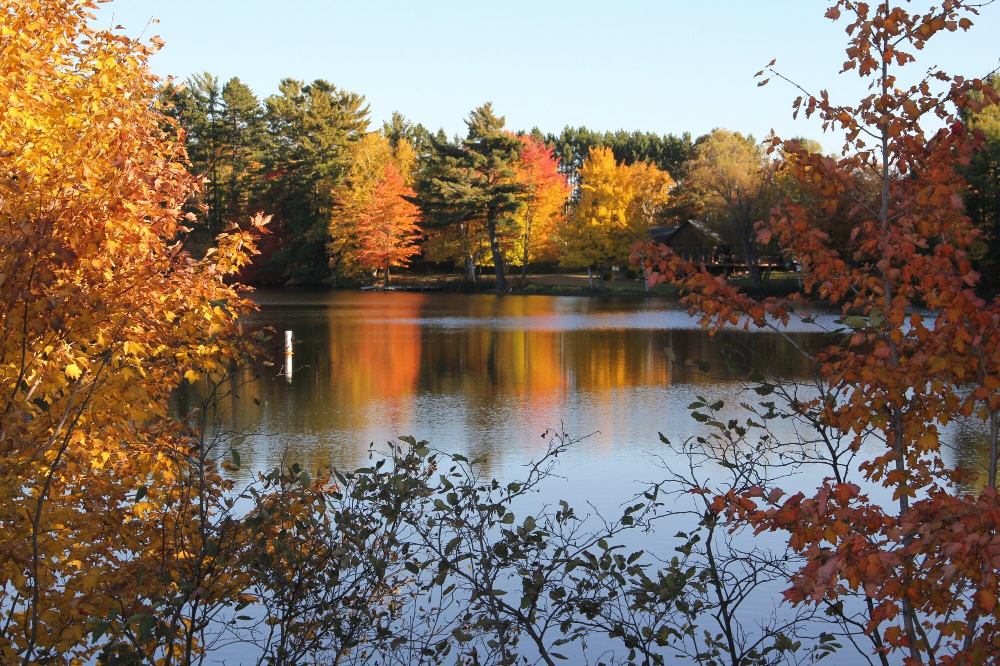 Fall colors reflected on an Eagle River lake