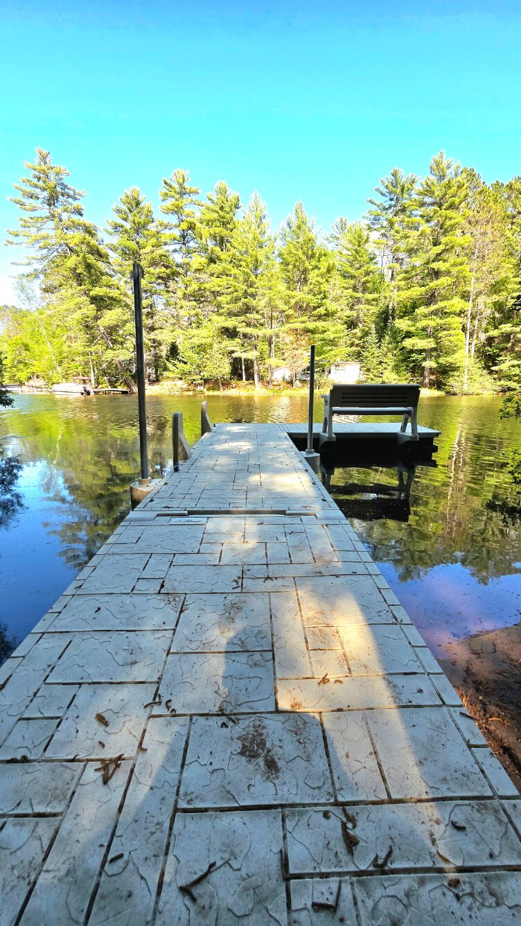 Private dock on the Deerskin River in summer